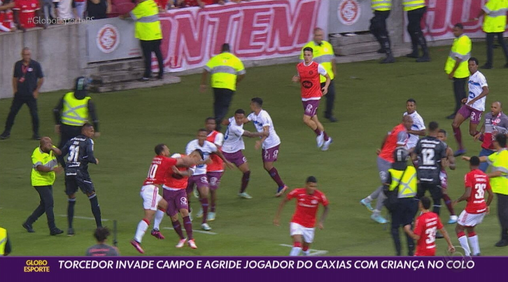 O que vai acontecer com torcedor que invadiu gramado do Beira-Rio com  criança para agredir um jogador?